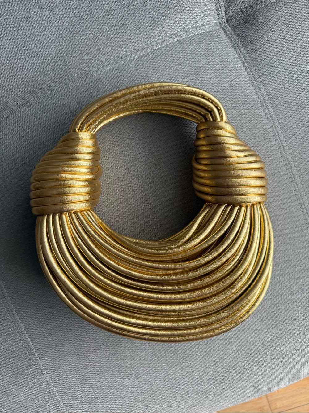 Gold metalic clutch bag